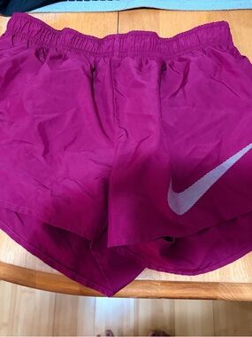 Nike Women's Magenta Athletic Shorts with Swoosh